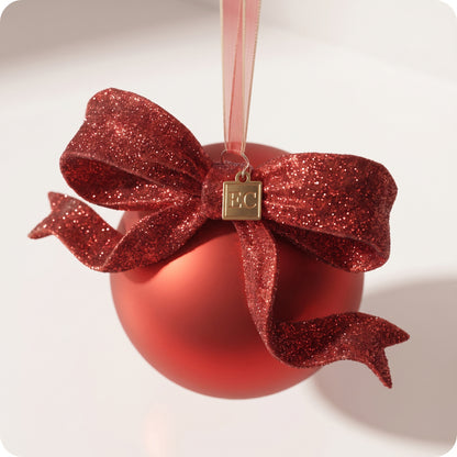 Esfera roja de vidrio con moño