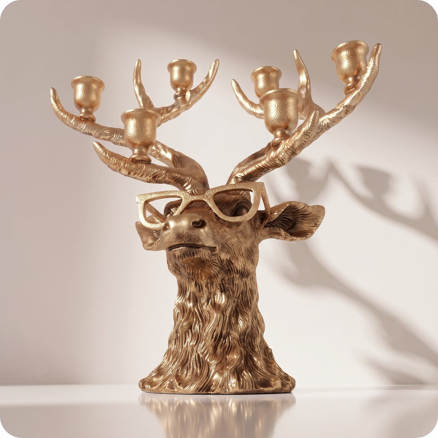 Candelabro dorado de reno con lentes