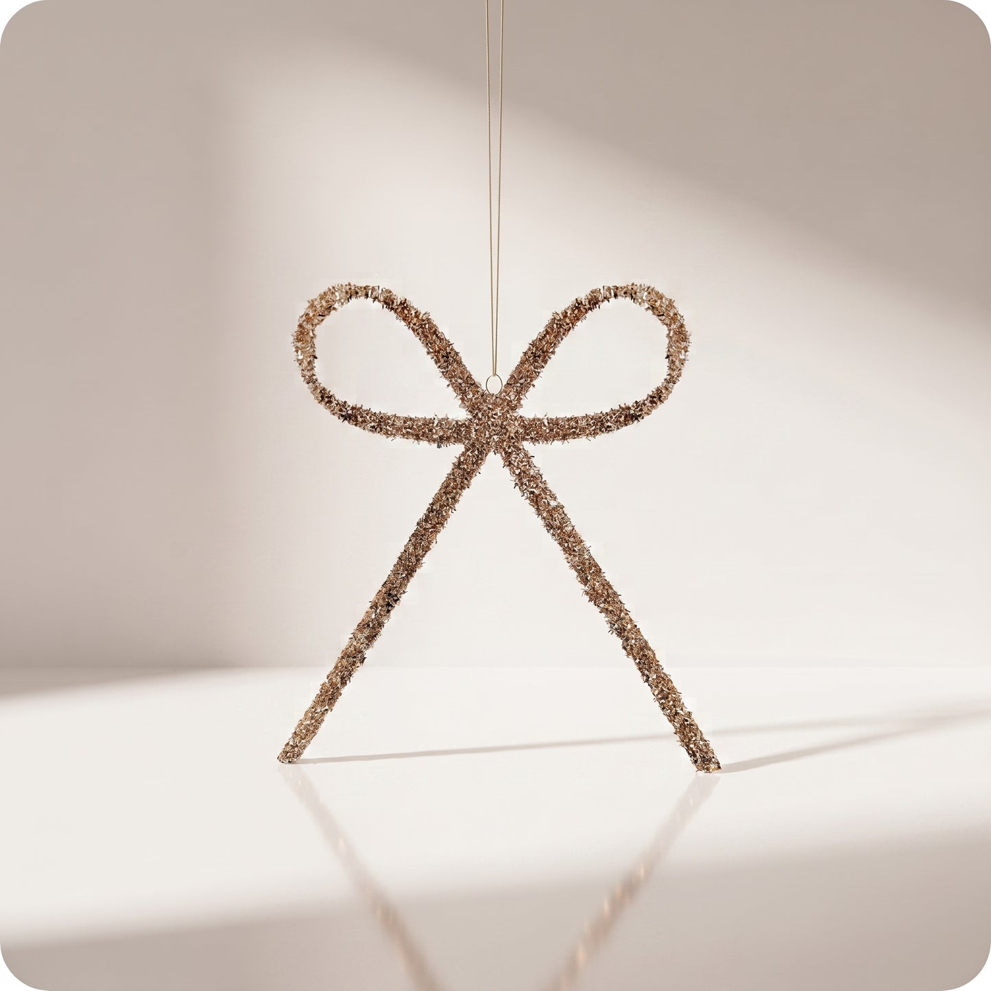 Esfera moño largo champagne con brillos rigido 35 y 25 cm