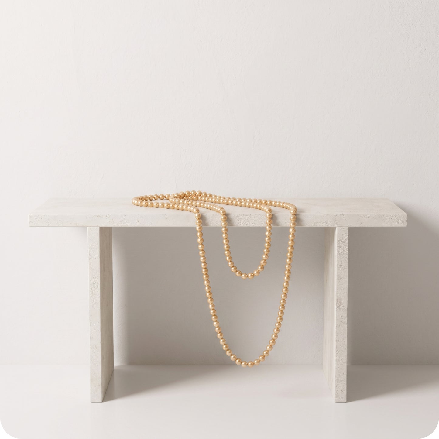 Guirnalda de pearl string doradas
